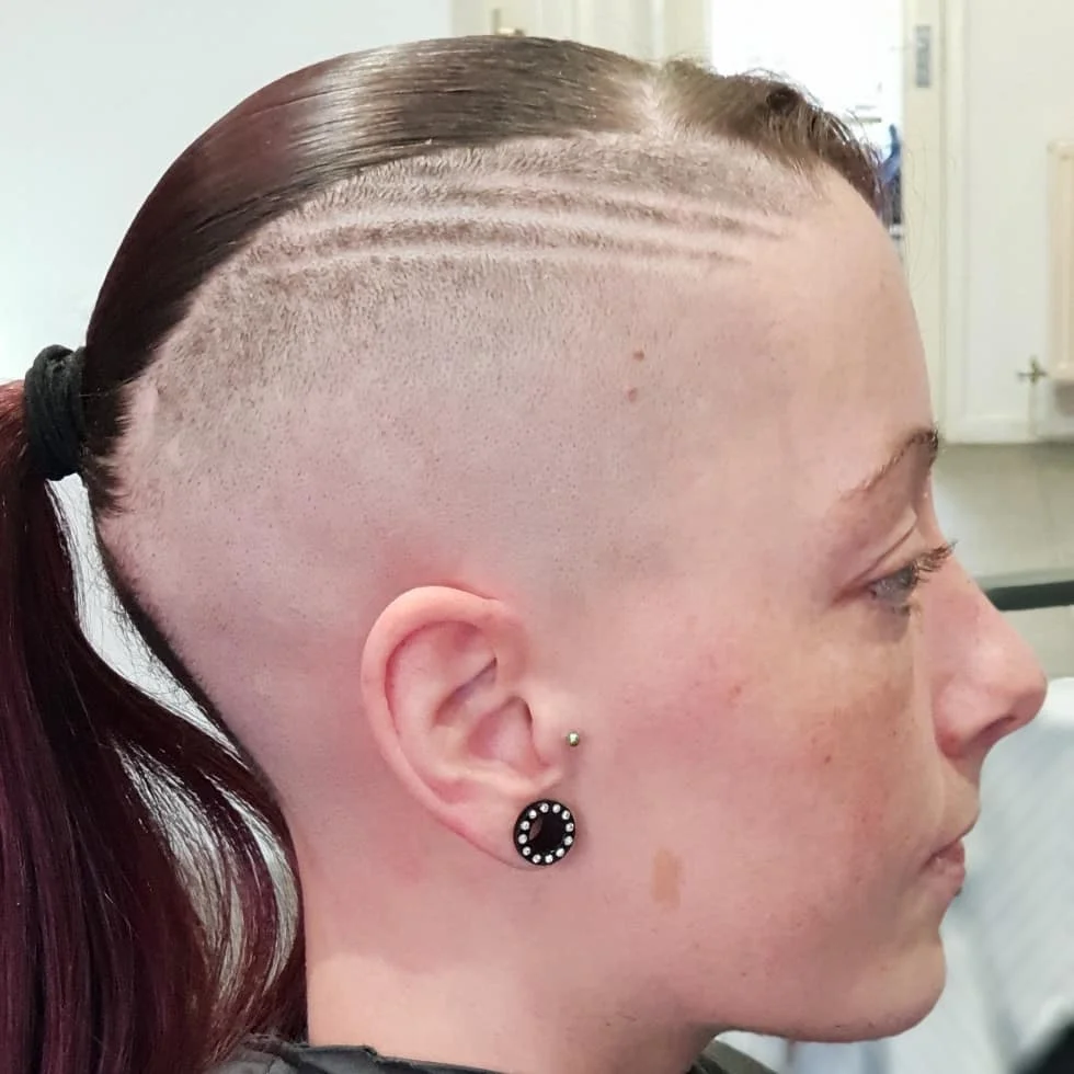 Women's undercut with sleek pulled-back top